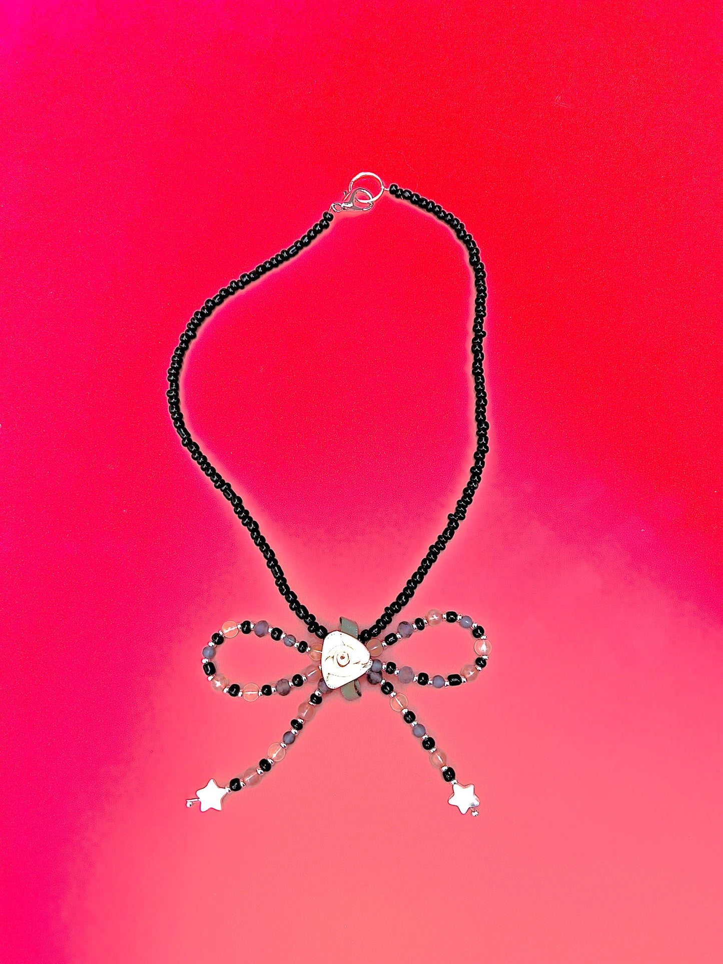 Alice bow necklace
