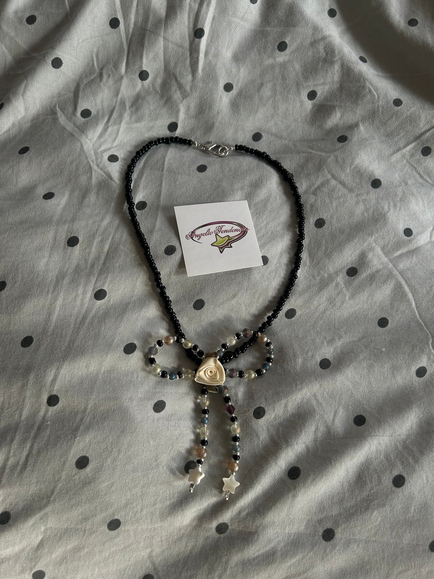 Alice bow necklace
