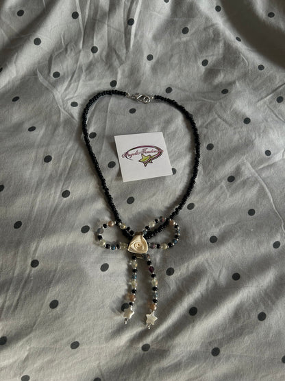 Alice bow necklace
