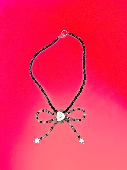 Alice bow necklace