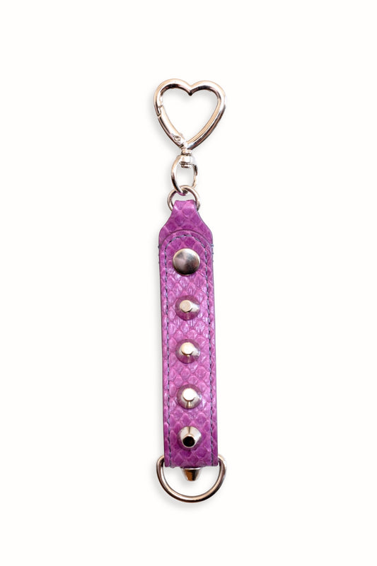 Purple keychain with heart-shaped keyring on a white background